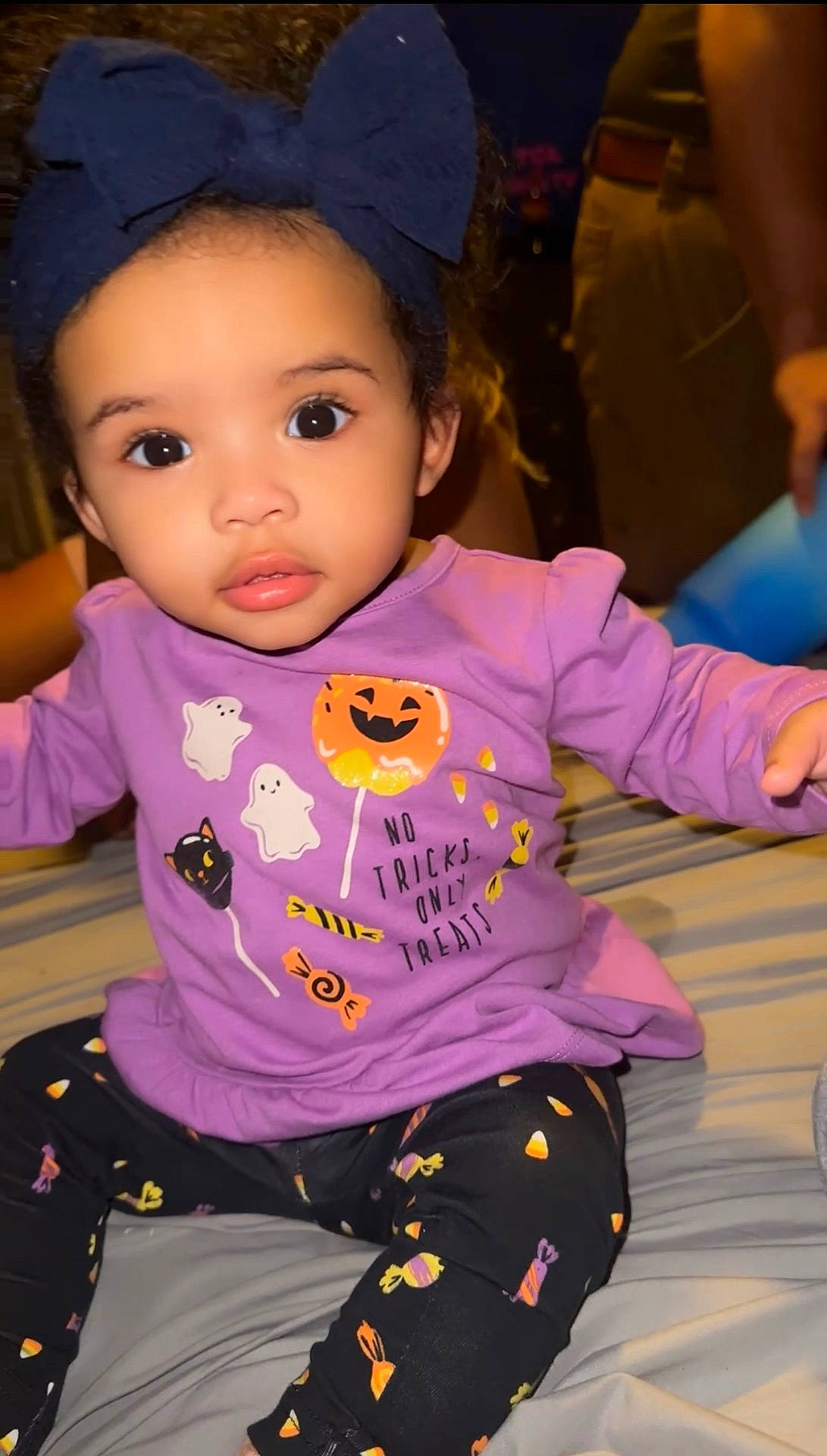 Sade joined the competition — help win amazing prizes! baby, bodypart, clothing, couch, cushion, face, furniture, happy, hat, head, homedecor, pajamas, pants, person, photography, portrait, sitting, sleeve, smile, t_shirt