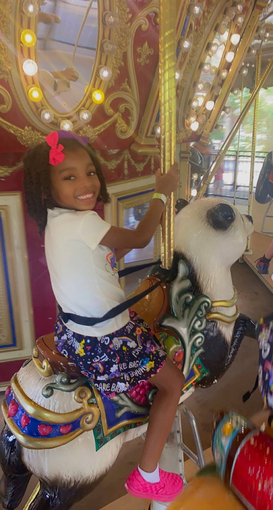 Ariana joined the competition — help win amazing prizes! amusement_ride, carousel, child, event, fun, happy, headwear, horse, joy, leisure, organ, person, photograph, recreation, riding_toy, shorts, smile, snapshot, t_shirt, toddler