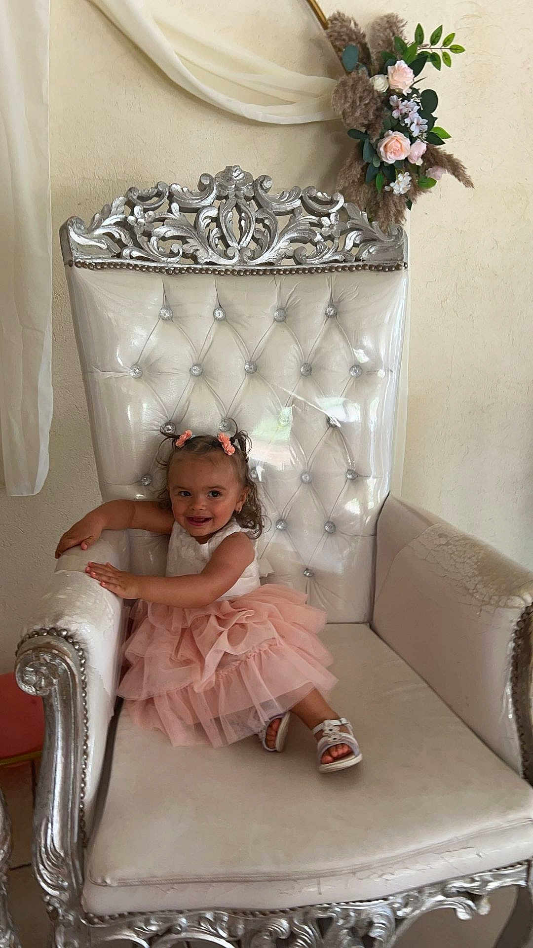 Kheina participe au concours pour gagner de l'argent avec cette photo : accessories, chair, child, clothing, dress, face, female, flower, flowerarrangement, flowerbouquet, furniture, girl, head, jewelry, person, photography, plant, portrait, sitting, throne