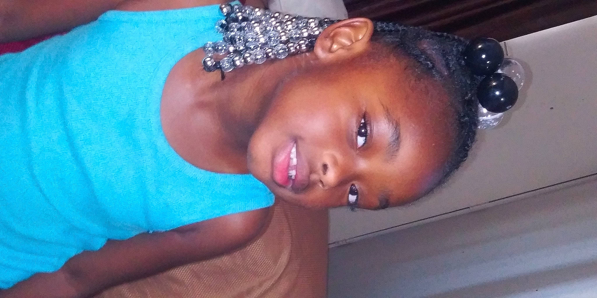 Odyssey is registered to the contest to win money with this photo: blue, body_jewelry, dress, earrings, electric_blue, eye, eyebrow, eyelash, face, flash_photography, forehead, happy, hat, head, headpiece, jewellery, lip, nose, person, smile