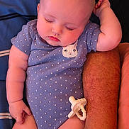 Journey joined the competition — help win amazing prizes! baby, sleeping, infant, onesie, polka_dot, pacifier, arm, adult, skin, hand, cute, peaceful, rest, closeup, face, child, napping, soft, human, comfort