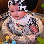 Journey is registered to the contest to win money with this photo: baby, infant, child, cow_print, headband, baby_seat, toy, cute, smile, clothing, indoor, portrait, playtime, colorful, comfort, face, hand, bright_eyes, baby_toys, soft_cushion