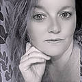 Nora G.