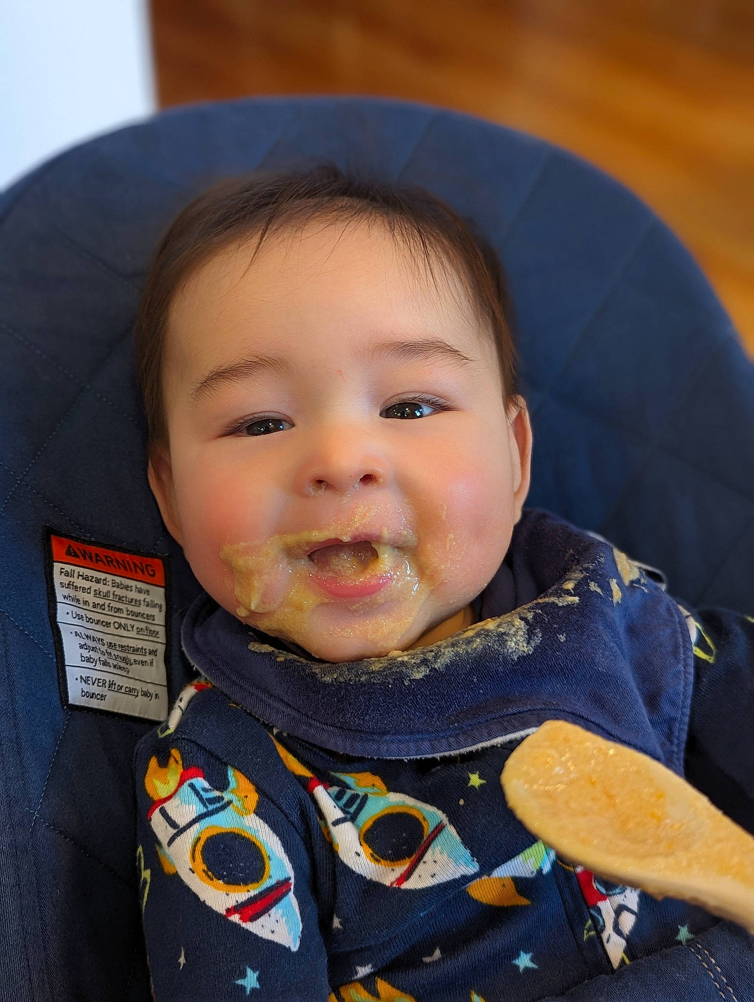 Tom is registered to the contest to win money with this photo: baby, baby_toddler_clothing, cheek, chin, cool, eye, eyebrow, facial_expression, forehead, happy, iris, jaw, lip, mouth, neck, nose, outerwear, person, skin, sleeve