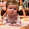 Izabella is registered to the contest to win money with this photo: baby, infant, child, crawling, sitting, portrait, face, eyes, smiling, pink_pajamas, clothing, bed, blanket, nursery, stuffed_animal, toys, warm_lighting, indoor, cozy, photography