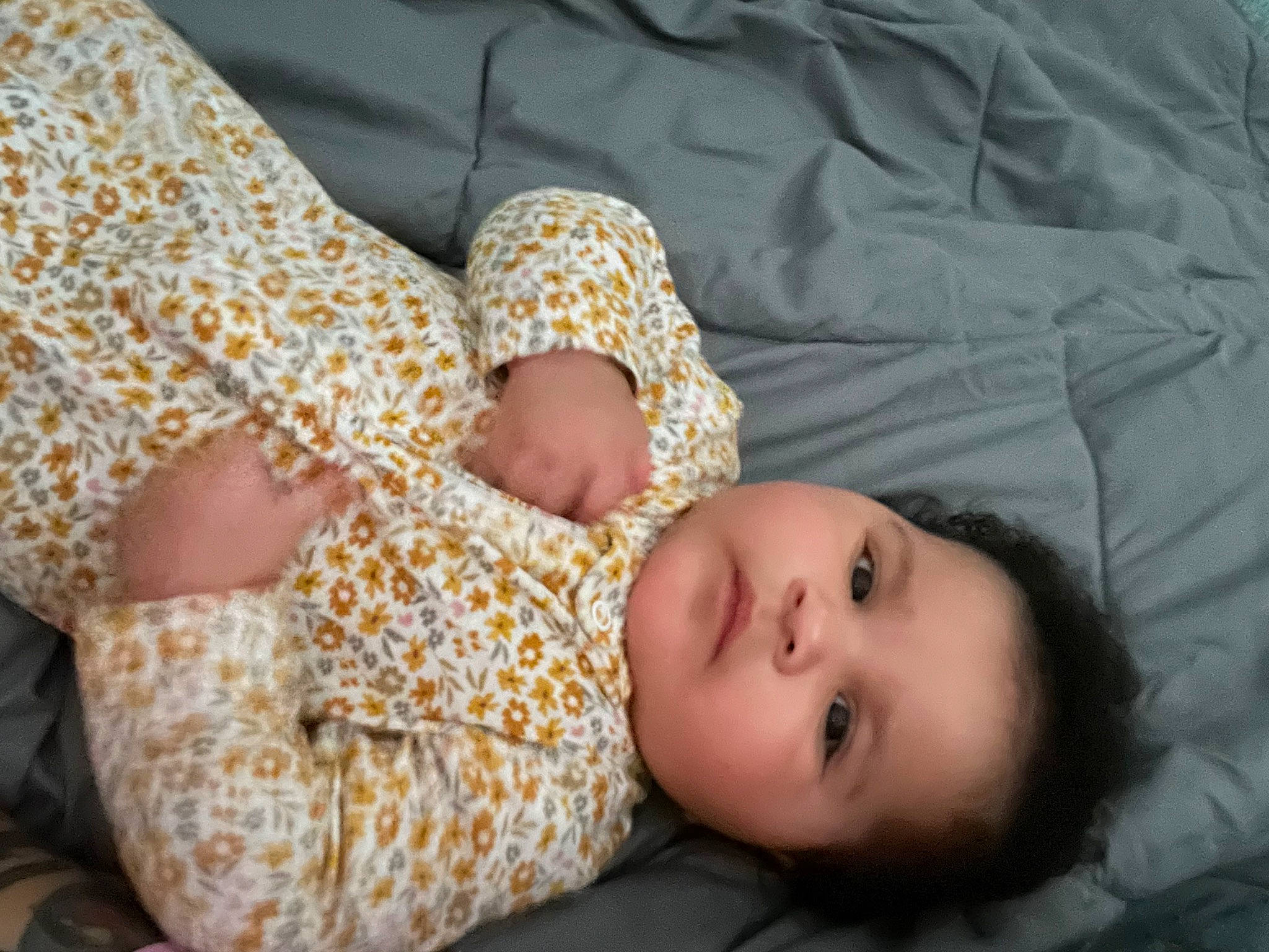 Jazelle is registered to the contest to win money with this photo: baby, baby_sleeping, baby_toddler_clothing, child, comfort, linens, nap, pattern, person, portrait_photography, skin, textile, toddler, wood