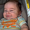 Bryan joined the competition — help win amazing prizes! arm, baby, car_seat, child, closeup, clothing, comfortable, cute, expression, face, hair, indoor, infant, portrait, seatbelt, skin, smile, striped_shirt, warning_label, young_child