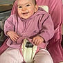 baby, baby_chair, baby_fashion, baby_seat, casual, child, cozy, fleece_jacket, furniture, happy, high_chair, home, indoor, infant, person, pink_clothing, portrait, seat_belt, smiling, young_child