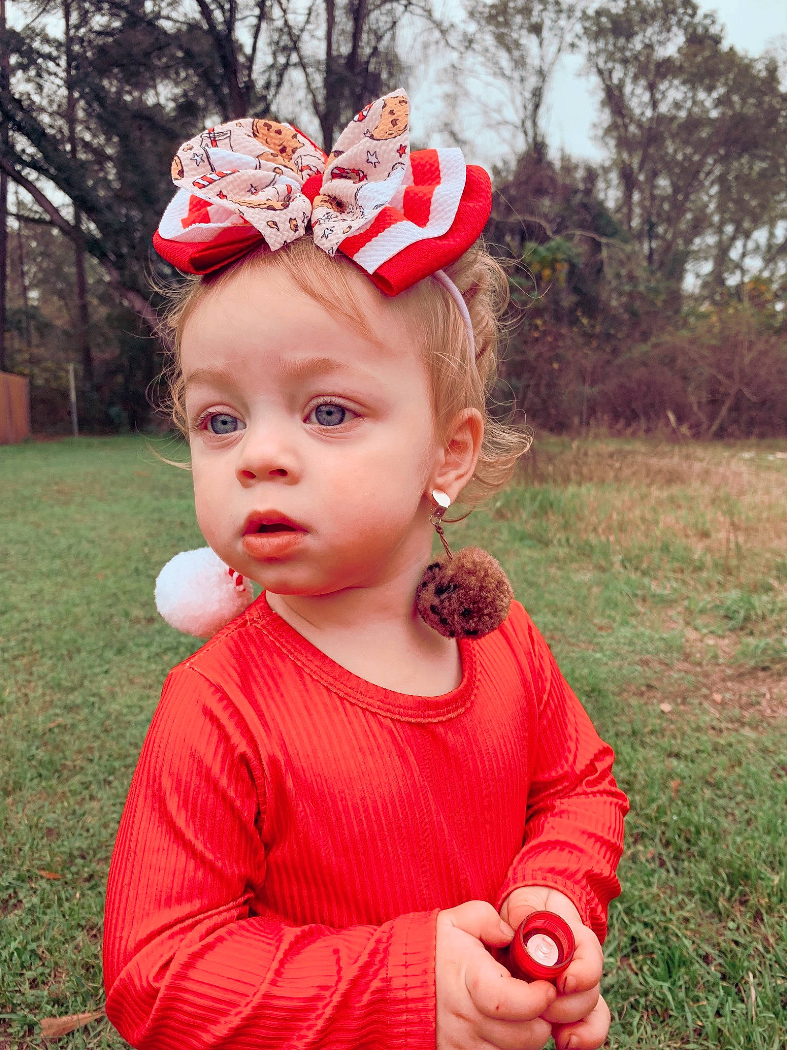 Liana joined the competition — help win amazing prizes! baby_toddler_clothing, cap, child, clothing, costume_hat, fashion_accessory, fun, grass, happy, headband, headpiece, lip, magenta, people, people_in_nature, person, pink, plant, sleeve, toddler