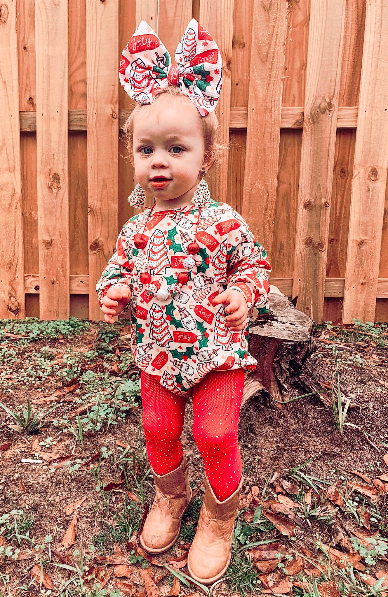 Liana joined the competition — help win amazing prizes! baby_toddler_clothing, child, clothing, costume_hat, eye, fun, grass, happy, head, headband, human_body, human_leg, leg, magenta, pattern, people_in_nature, person, pink, sitting, sleeve