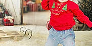 Brooklyn is registered to the contest to win money with this photo: baby, blond_hair, blue_eyes, celebration, child, christmas_tree, cute, decorations, festive, happy, holiday, indoor, jeans, portrait, red_sweater, rug, seasonal, smiling, standing, wreath