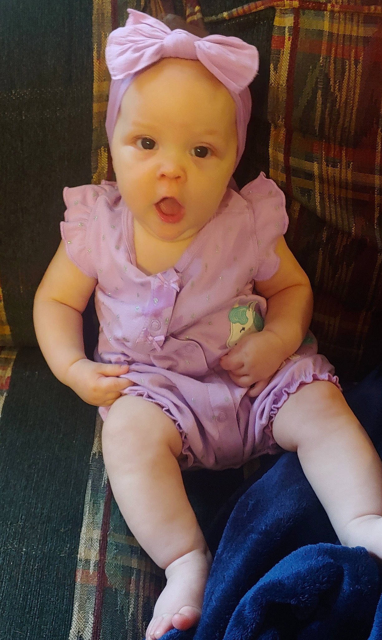 Braelynn is registered to the contest to win money with this photo: baby, cheek, child, headgear, headwear, person, sitting, skin, surprise, toddler