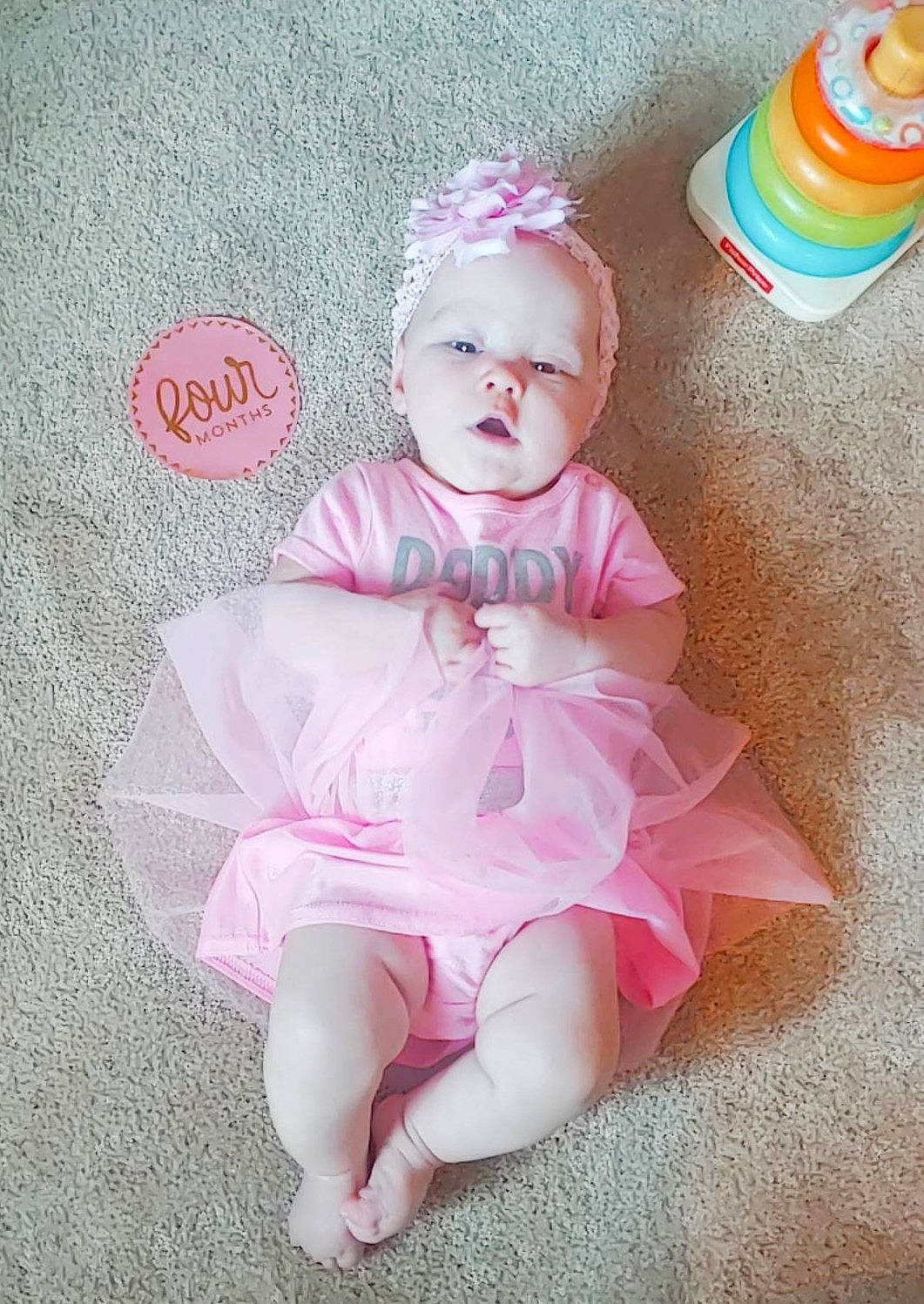 Braelynn is registered to the contest to win money with this photo: baby, baby_toddler_clothing, child, costume, dress, peach, person, pink, product, smile, sweetness, toddler