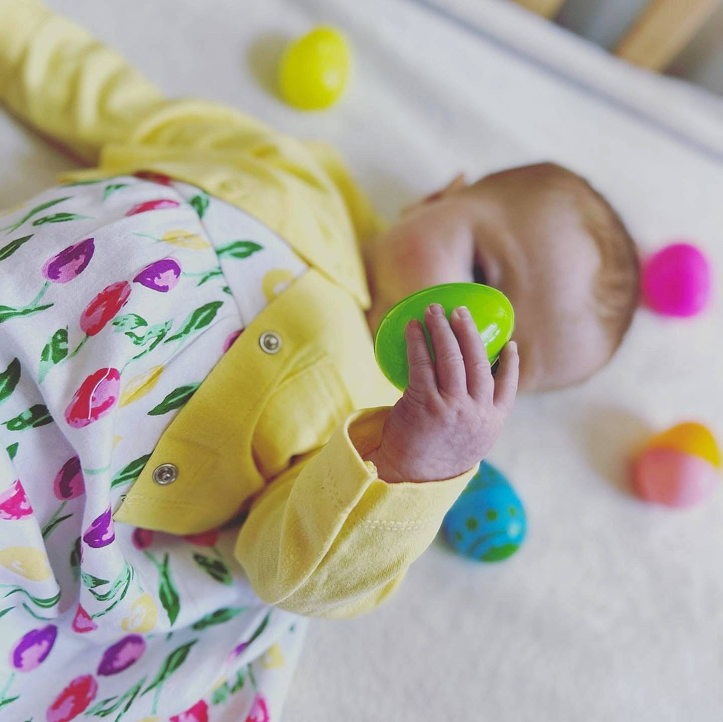 Mackenzie joined the competition — help win amazing prizes! baby, baby_playing_with_toys, baby_products, baby_sleeping, baby_toddler_clothing, child, comfort, finger, hand, infant_bed, linens, mammal, person, product, room, skin, stuffed_toy, textile, toddler, toy