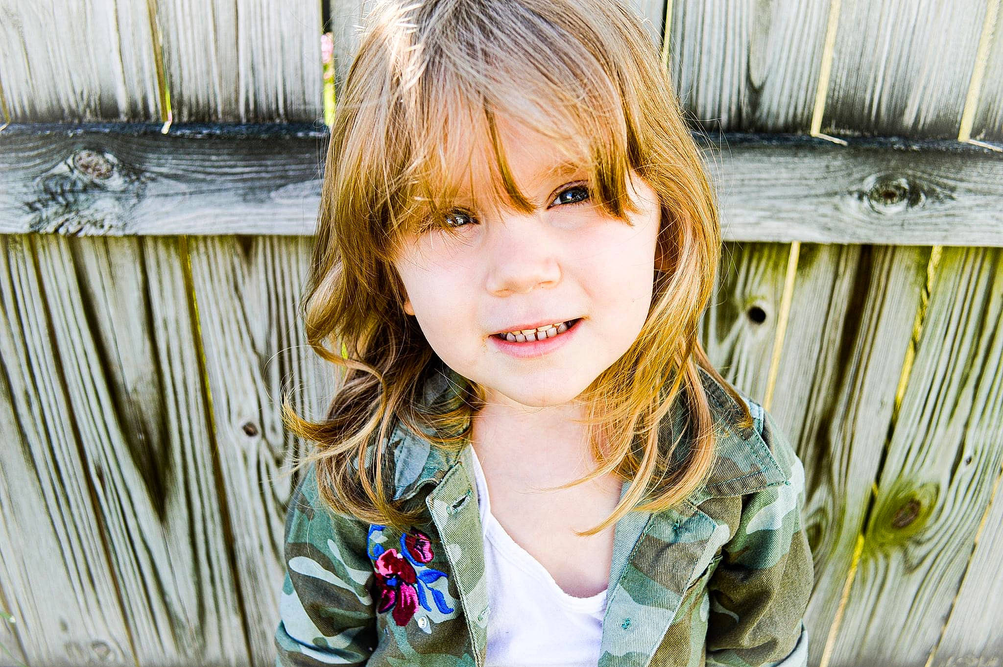 Leda is registered to the contest to win money with this photo: bangs, child, eye, eyelash, facial_expression, fashion, grass, hair, hairstyle, happy, head, iris, layered_hair, lip, long_hair, people_in_nature, person, step_cutting, street_fashion, summer