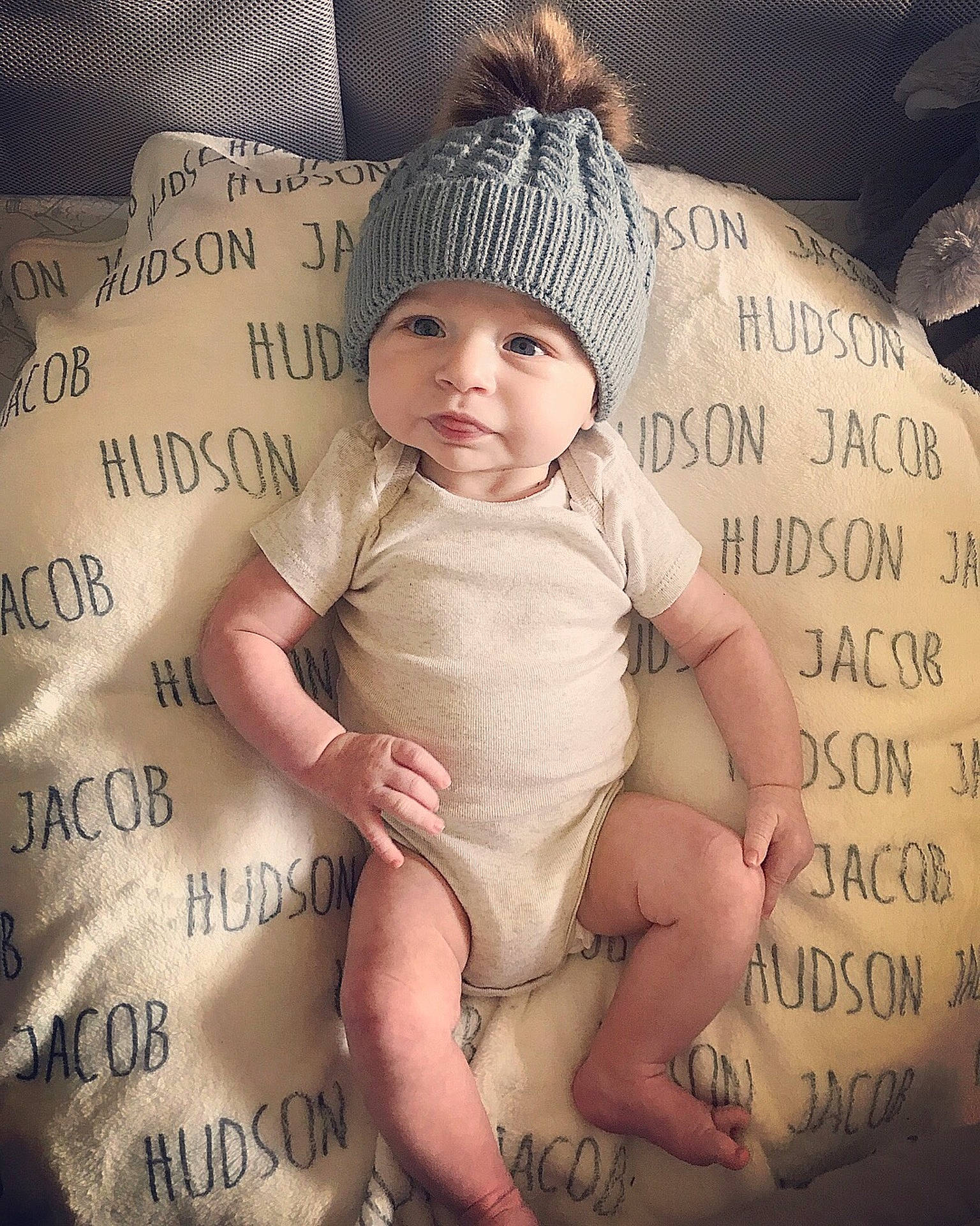 Hudson is registered to the contest to win money with this photo: cheek, child, hair_accessory, happiness, headgear, headwear, infant, person, photo_caption, product, toddler