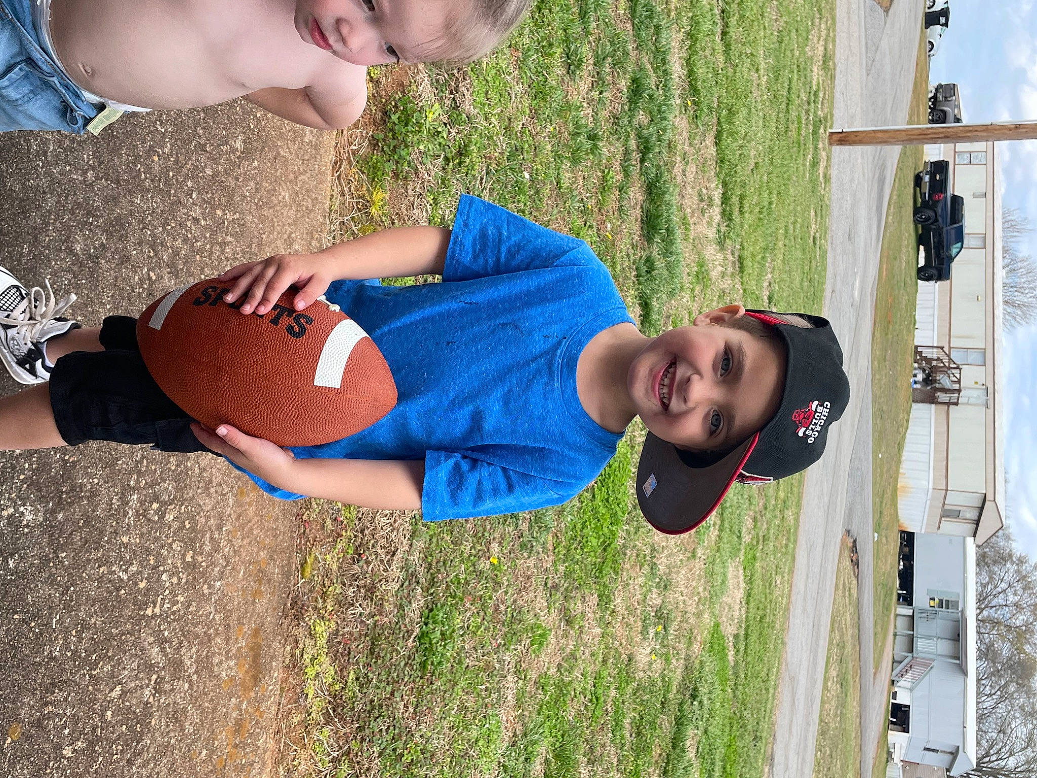 Jaxyn joined the competition — help win amazing prizes! azure, daytime, elbow, facial_expression, fun, gesture, grass, green, happy, headwear, joy, knee, leisure, people, people_in_nature, person, photograph, plant, smile, summer