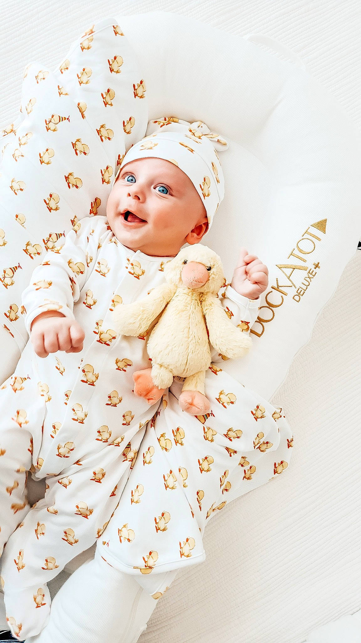 Alessio is registered to the contest to win money with this photo: baby, baby_sleeping, child, fictional_character, headwear, peach, person, smile, toddler