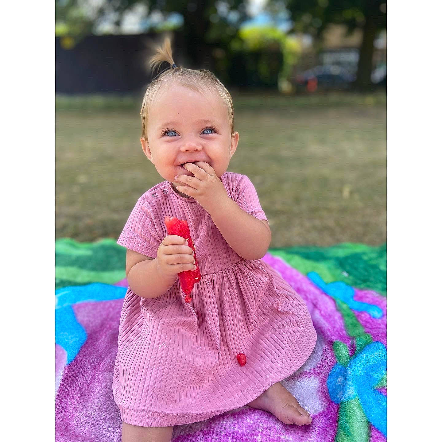 Nellie joined the competition — help win amazing prizes! baby, baby_toddler_clothing, beauty, child, dress, face, gesture, grass, hair, happy, joy, leisure, magenta, people_in_nature, person, pink, purple, skin, sleeve, smile