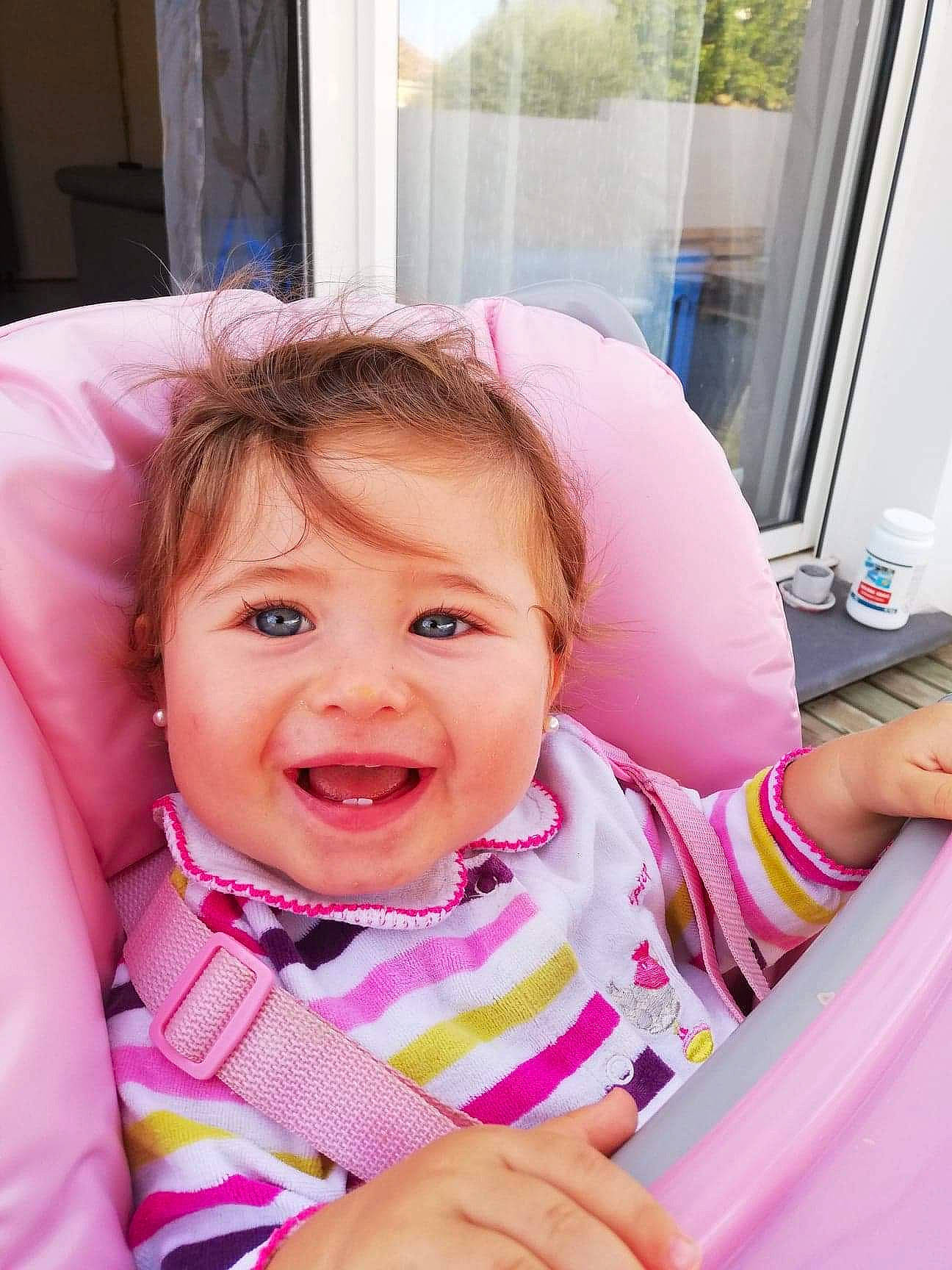 Zélie participe au concours pour gagner de l'argent avec cette photo : baby, baby_products, cheek, child, daughter, face, joy, lip, nose, person, pink, product, skin, smile, toddler