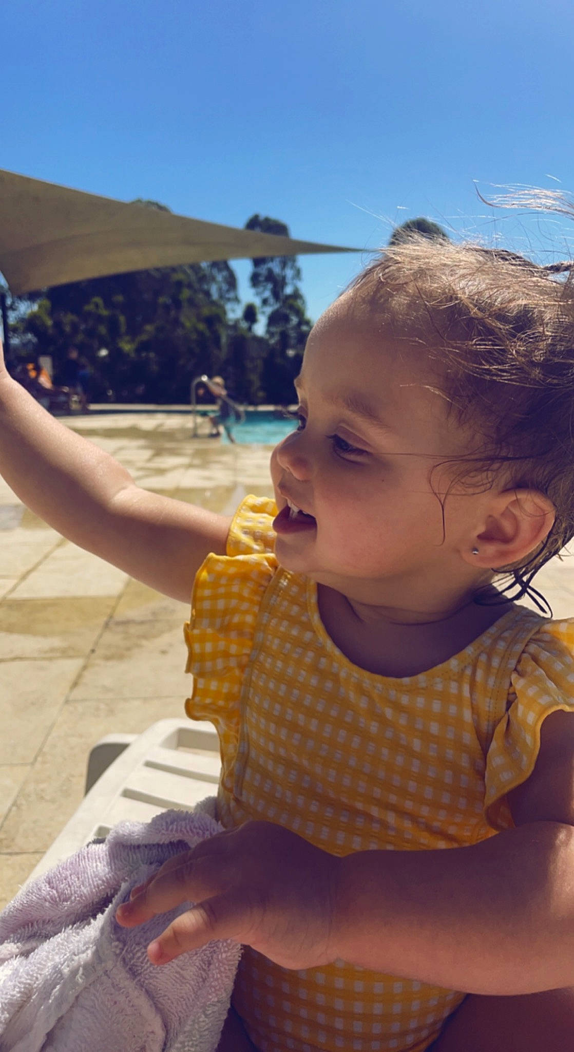 Amaya is registered to the contest to win money with this photo: baby, baby_toddler_clothing, child, food, fun, gesture, grass, hairstyle, happy, leisure, mouth, nose, person, recreation, skin, sky, summer, tableware, thumb, toddler