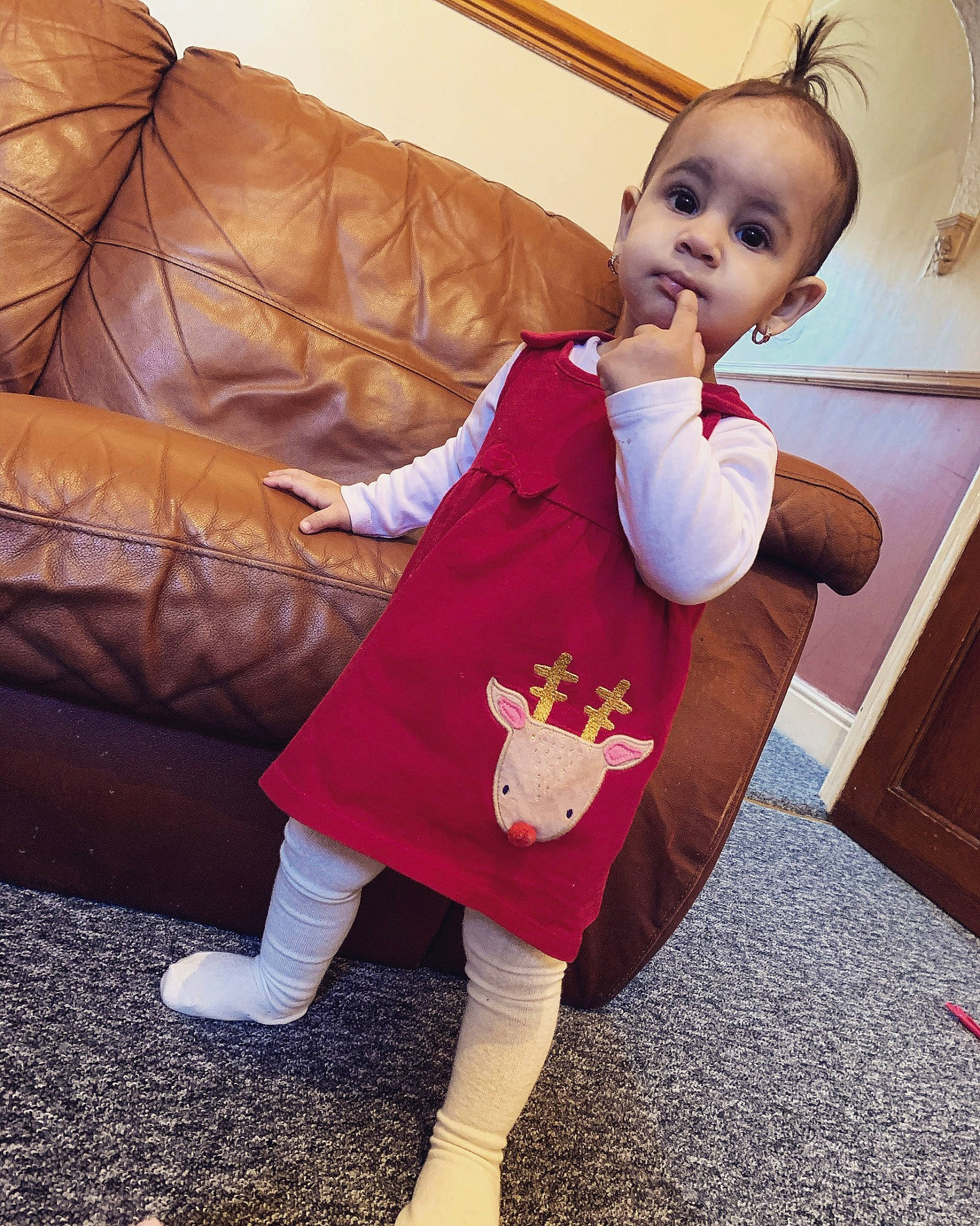 Anais is registered to the contest to win money with this photo: baby, child, dress, ear, head, leg, outerwear, person, sleeve, toddler