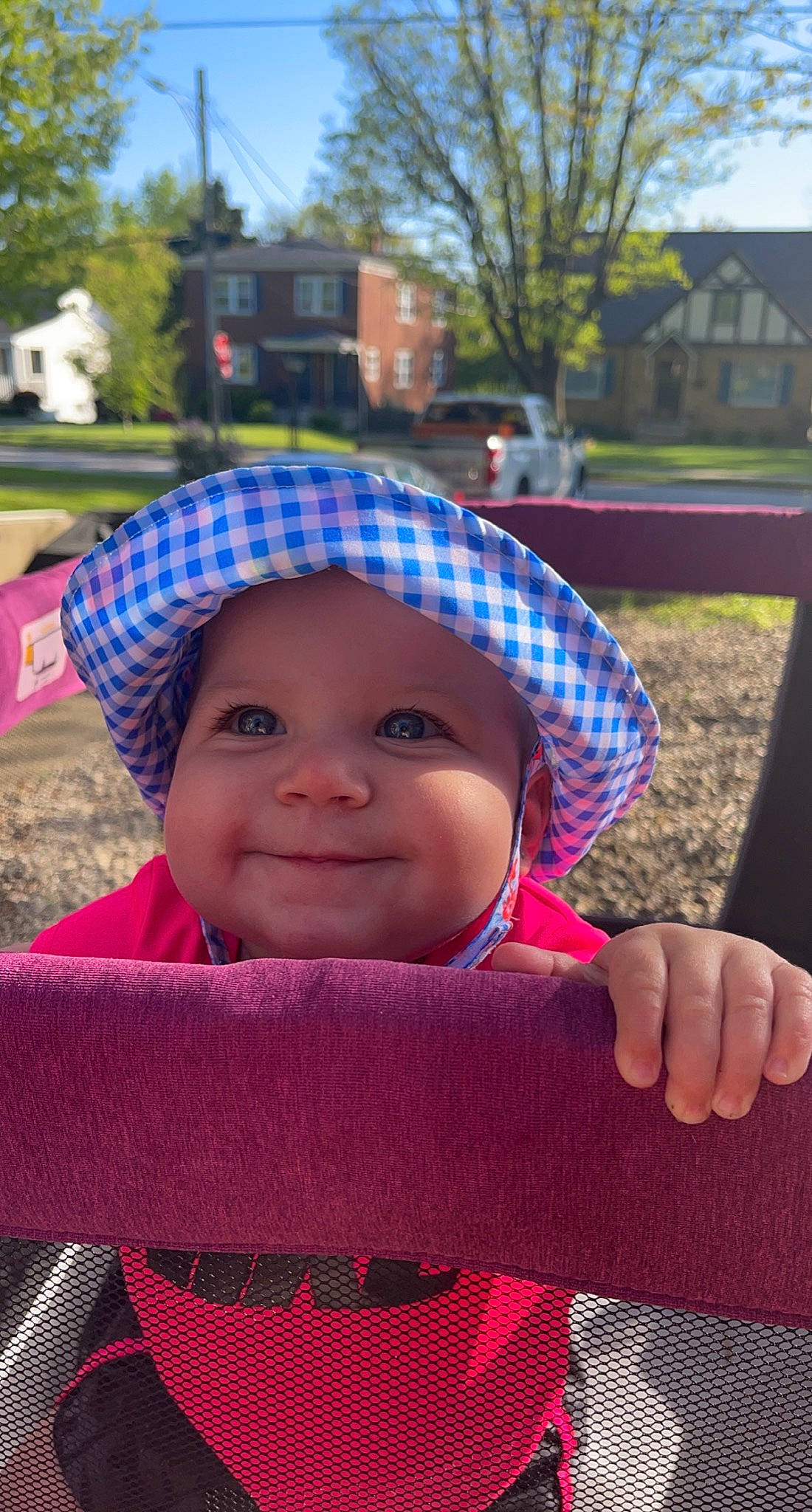 Hadlee joined the competition — help win amazing prizes! baby, cap, cool, facial_expression, grass, happy, hat, headgear, headwear, joy, leaf, lip, person, pink, plant, public_space, purple, red, skin, smile
