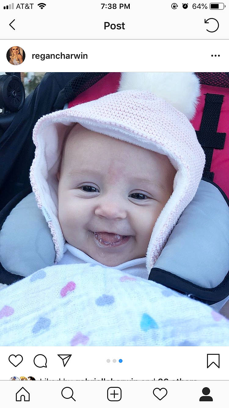 Kambrie joined the competition — help win amazing prizes! baby, cheek, child, face, head, headgear, joy, knit_cap, mouth, person, photo_caption, photograph, photography, pink, product, skin, smile, snapshot, toddler