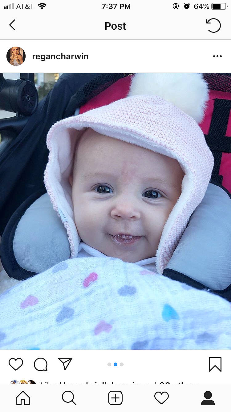 Kambrie joined the competition — help win amazing prizes! baby, cheek, child, face, head, headgear, headwear, person, photo_caption, photograph, photography, pink, product, skin, smile, snapshot, toddler