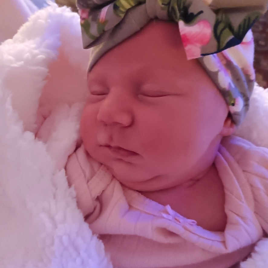 Lilly Grace joined the competition — help win amazing prizes! adorable, baby, blanket, child, cozy, cute, face, floral, headband, indoors, infant, newborn, peaceful, pink_clothing, portrait, resting, sleeping, soft_texture, toddler, wrapped