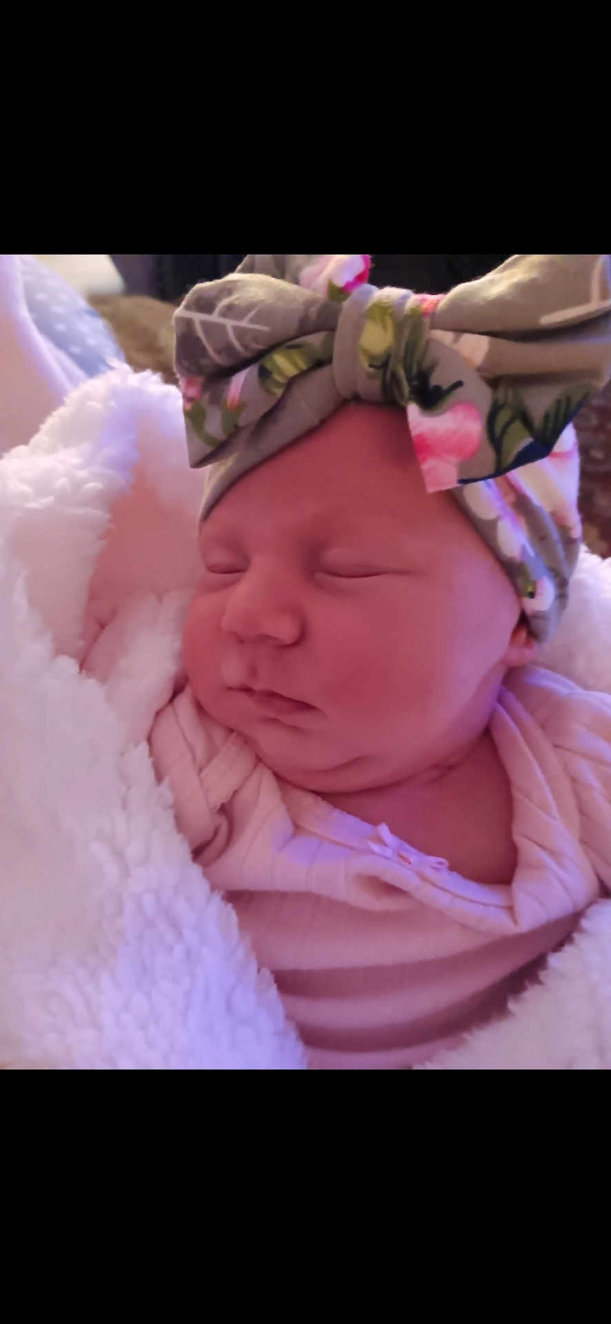 Lilly Grace joined the competition — help win amazing prizes! baby, newborn, sleeping, blanket, headband, floral, pink_clothing, cute, infant, face, soft_texture, wrapped, peaceful, child, portrait, indoors, cozy, resting, toddler, adorable