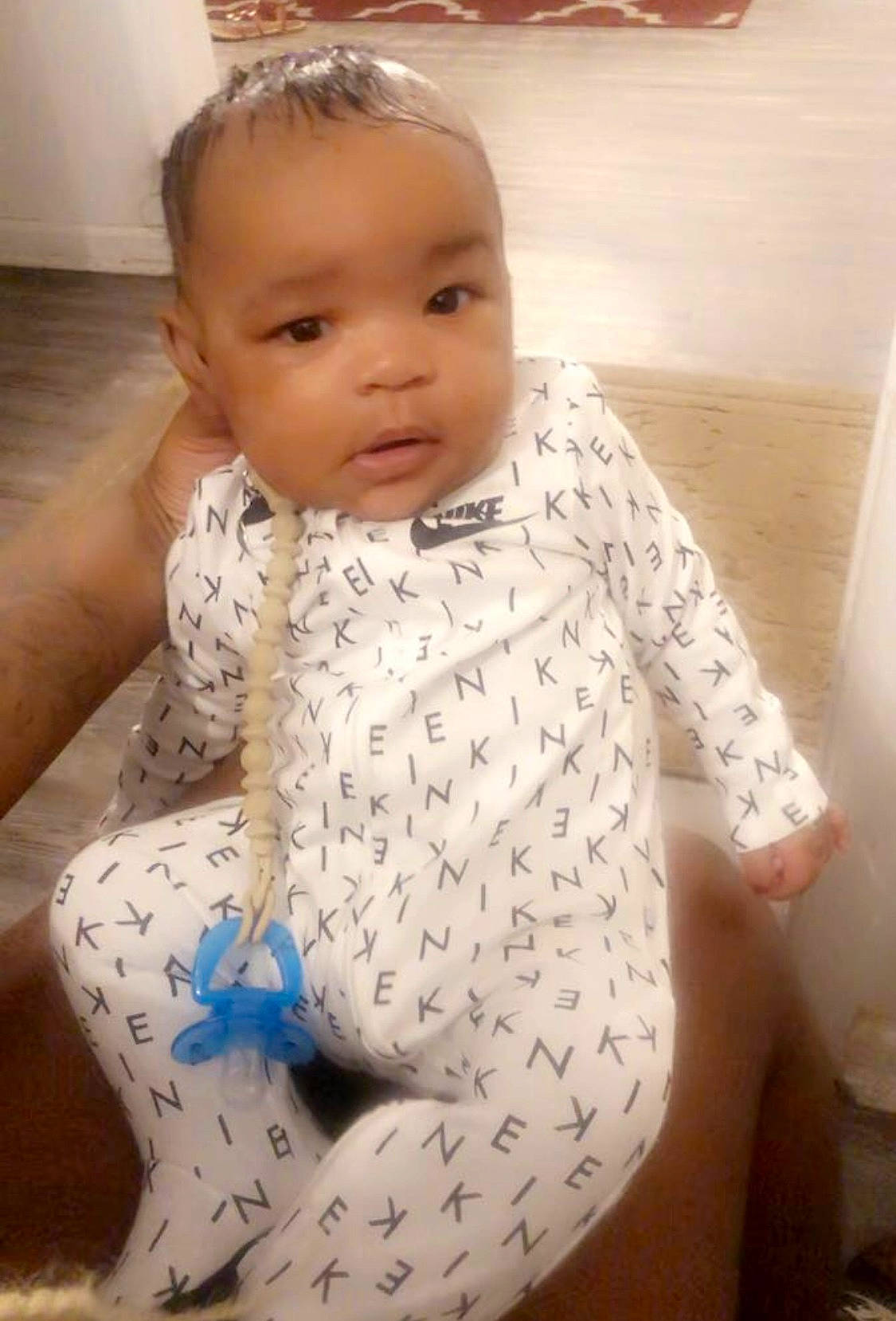 Kaydius is registered to the contest to win money with this photo: arm, baby, baby_toddler_clothing, cheek, comfort, dress, eyebrow, face, finger, hairstyle, happy, head, iris, lip, neck, nose, outerwear, person, skin, sleeve