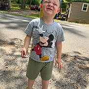 Erich joined the competition — help win amazing prizes! child, boy, cap, tshirt, mickey_mouse, shorts, green_shoes, outdoor, daylight, road, trees, sunlight, shadow, playful, cute, casual_clothing, smiling, standing, nature, summer