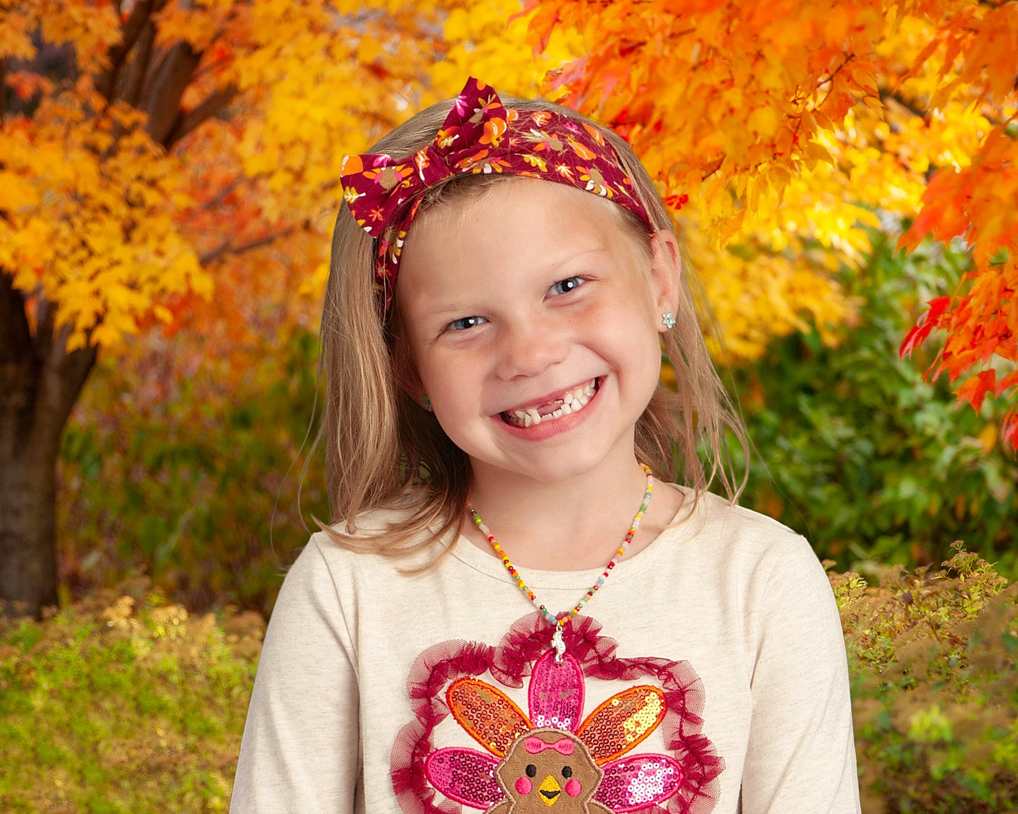 Theadora joined the competition — help win amazing prizes! botany, eye, face, fawn, grass, hair, happy, head, headpiece, headwear, iris, joy, leaf, neck, people_in_nature, person, plant, red, sleeve, smile