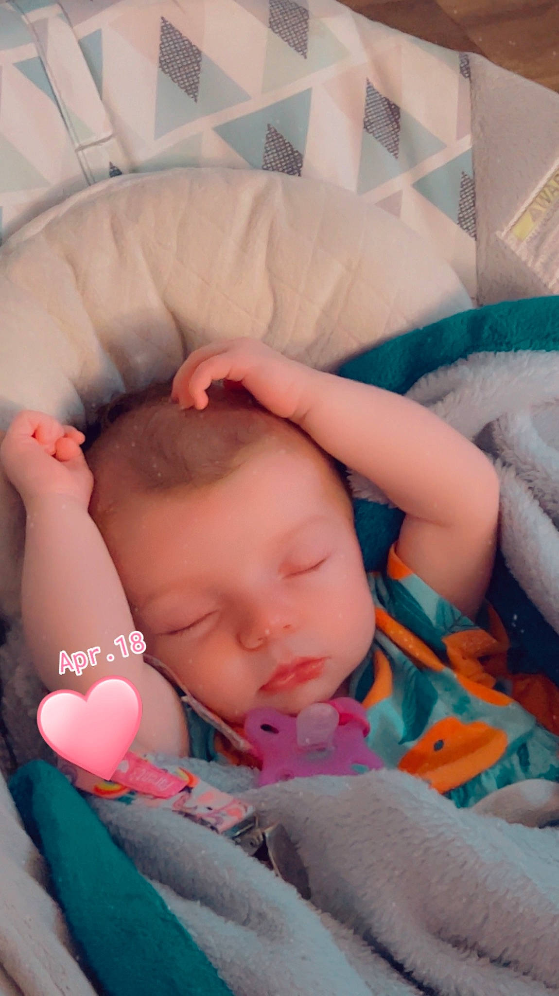 Emery is registered to the contest to win money with this photo: baby, baby_products, baby_sleeping, baby_toddler_clothing, bedtime, cheek, child, comfort, finger, hand, human_body, iris, leg, linens, mouth, nose, orange, person, skin, textile