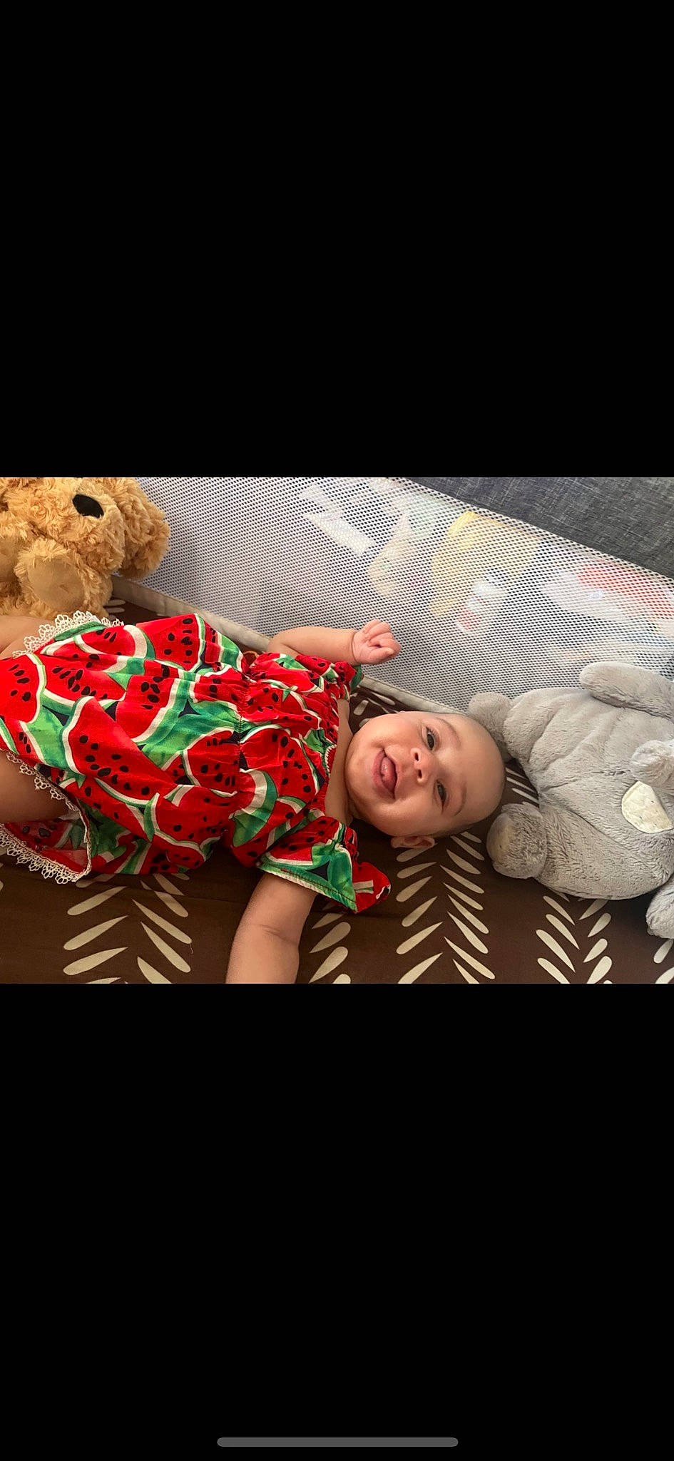 Aurora joined the competition — help win amazing prizes! baby, baby_toddler_clothing, bedding, child, comfort, couch, flash_photography, happy, human_leg, linens, magenta, pattern, person, pillow, room, sitting, sleeve, smile, t_shirt, thigh