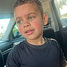Jacob joined the competition — help win amazing prizes! black_shirt, boy, car_interior, casual, child, curly_hair, daylight, expression, indoor, natural_light, person, portrait, rosy_cheeks, seat, seatbelt, short_hair, thoughtful, vehicle, window, young