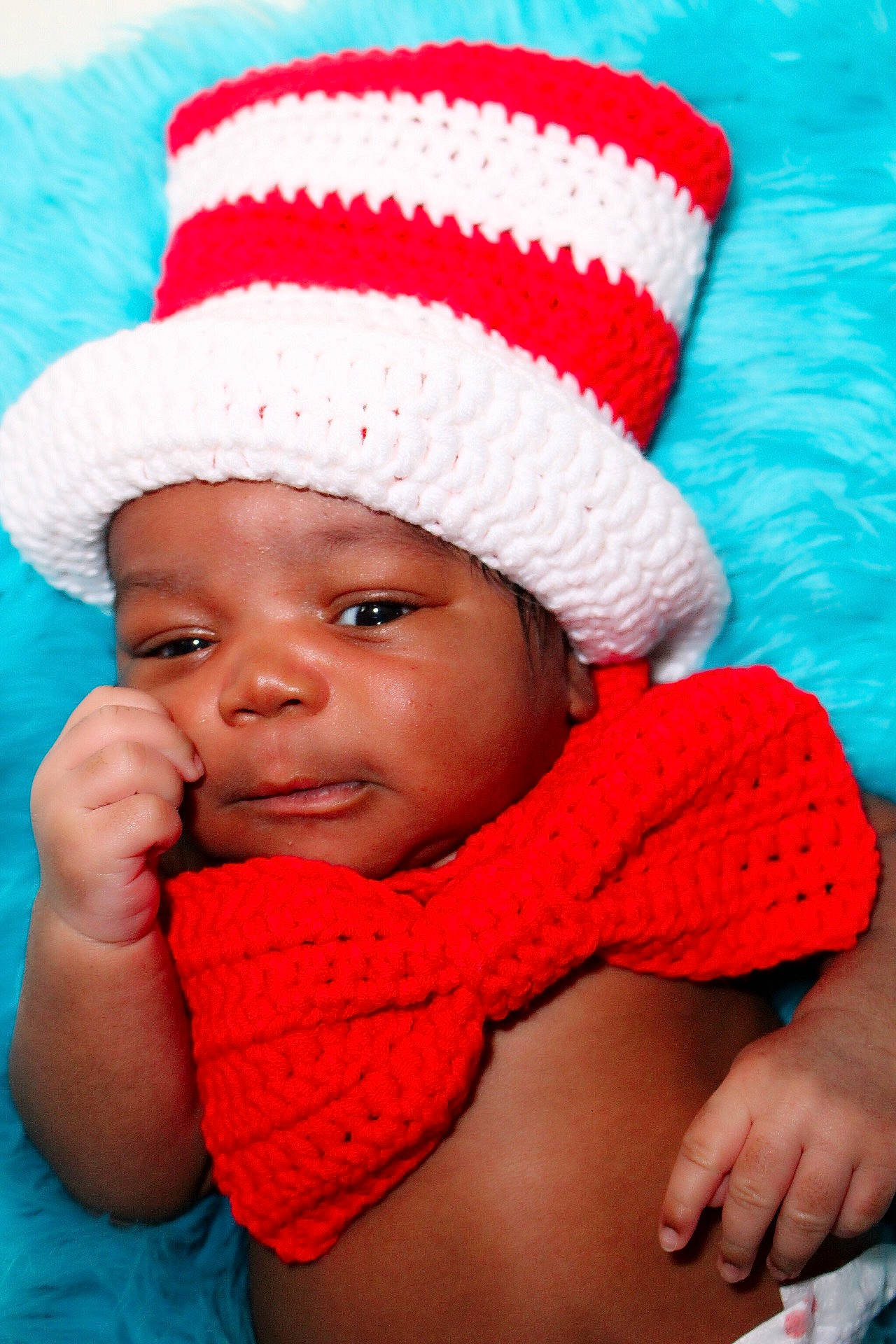 Tahj joined the competition — help win amazing prizes! beanie, bonnet, cap, cheek, child, crochet, fun, girl, happiness, hat, headgear, headwear, infant, knit_cap, knitting, person, product, skin, smile, sun_hat