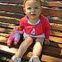 Romane participe au concours pour gagner de l'argent avec cette photo : toddler, child, doll, bench, outdoor, sunlight, shoes, sandals, pink_clothing, coral_cardigan, face, blue_eyes, grass, shadow, wood, summer, happy, cute, person, daylight