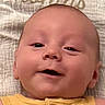 Matthew joined the competition — help win amazing prizes! baby, smiling, face, infant, yellow_clothing, blanket, lying_down, cute, happy, skin, head, child, portrait, closeup, young, person, indoors, soft_texture, baby_face, expression