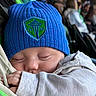 baby, sleeping, hat, knit_hat, blue_hat, sweater, gray_sweater, infant, closeup, face, peaceful, cozy, hand, indoor, people, blurred_background, portrait, child, cute, resting