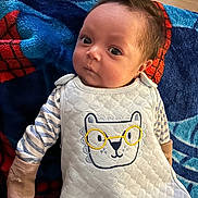 Niklaus joined the competition — help win amazing prizes! baby, infant, child, onesie, embroidery, glasses_design, striped_sleeves, mittens, blanket, towel, portrait, cute, big_eyes, hair, fair_skin, lying_down, indoor, textile_pattern, blue_color, soft_light