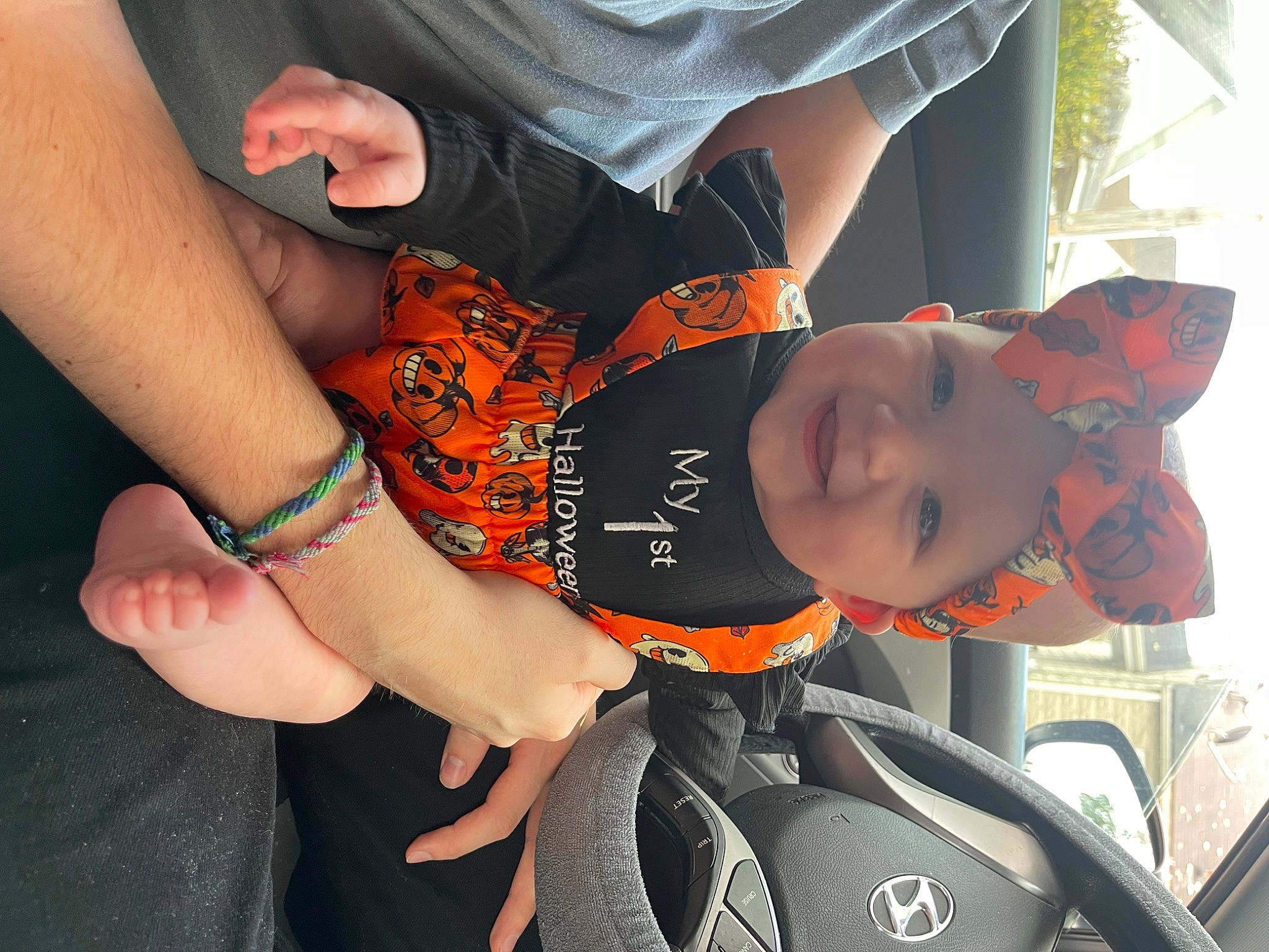 Everlee joined the competition — help win amazing prizes! arm, baby, baby_carriage, cool, elbow, eyewear, finger, fun, gesture, hand, happy, hat, headwear, human_body, human_leg, joy, person, smile, steering_wheel, thigh