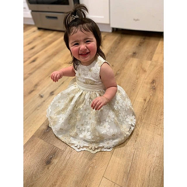 Aliyana joined the competition — help win amazing prizes! a_line, baby, beige, bridal_clothing, bridal_party_dress, child, clothing, dress, floor, flooring, gown, happy, joy, person, play, smile, square, toddler, wedding_dress, white