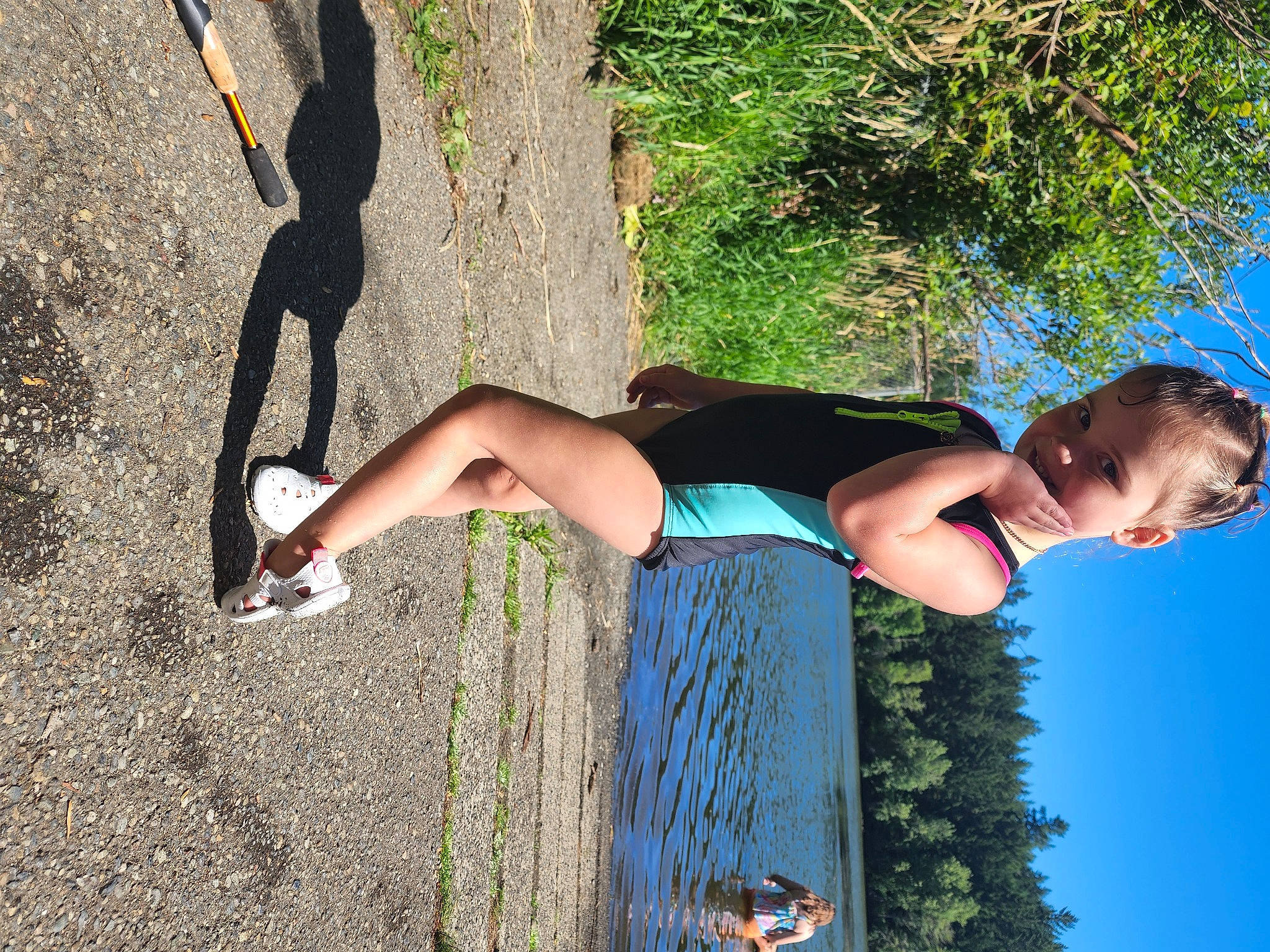 Mckinley is registered to the contest to win money with this photo: arm, elbow, electric_blue, grass, hairstyle, happy, human_leg, joint, joy, knee, leg, leisure, people_in_nature, person, plant, sky, summer, thigh, tree, waist