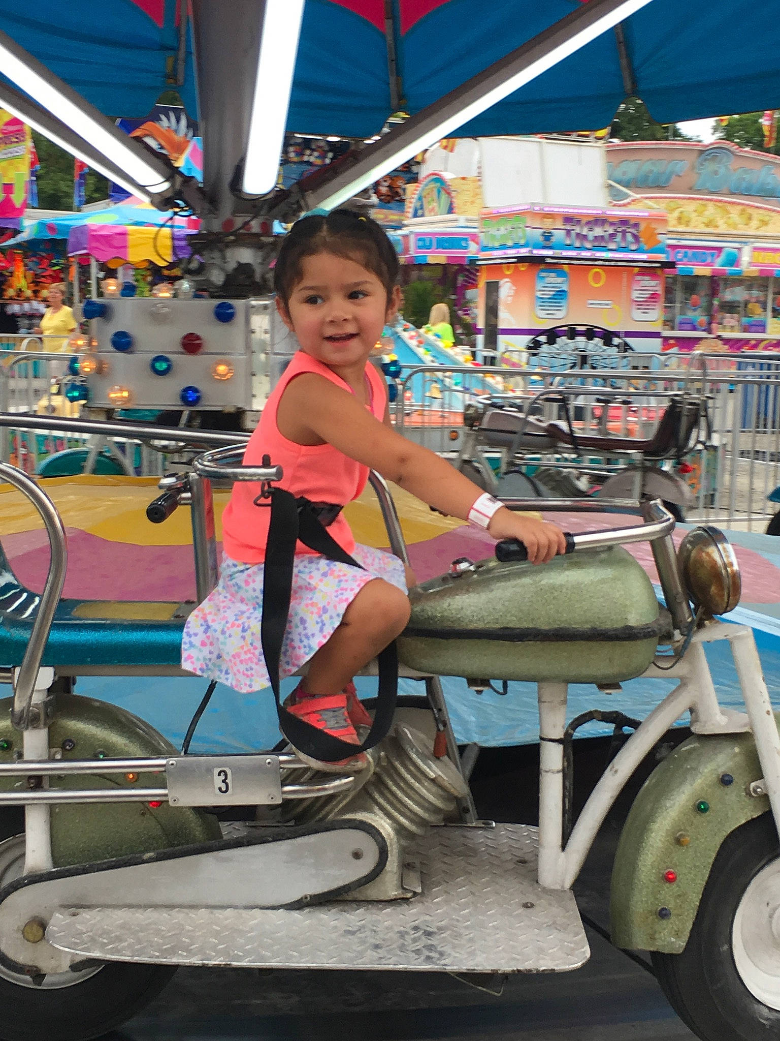 Cynthia joined the competition — help win amazing prizes! amusement_park, amusement_ride, auto_part, car, carousel, child, fair, fun, mode_of_transport, motor_vehicle, nonbuilding_structure, park, person, photography, recreation, smile, toddler, tourist_attraction, vacation, vehicle