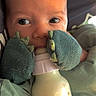 Braylen is registered to the contest to win money with this photo: baby, bottle, feeding, mittens, green_mittens, blanket, infant, closeup, face, eyes, cute, cozy, indoors, child, soft, warm, sleepwear, baby_bottle, feeding_time, portrait