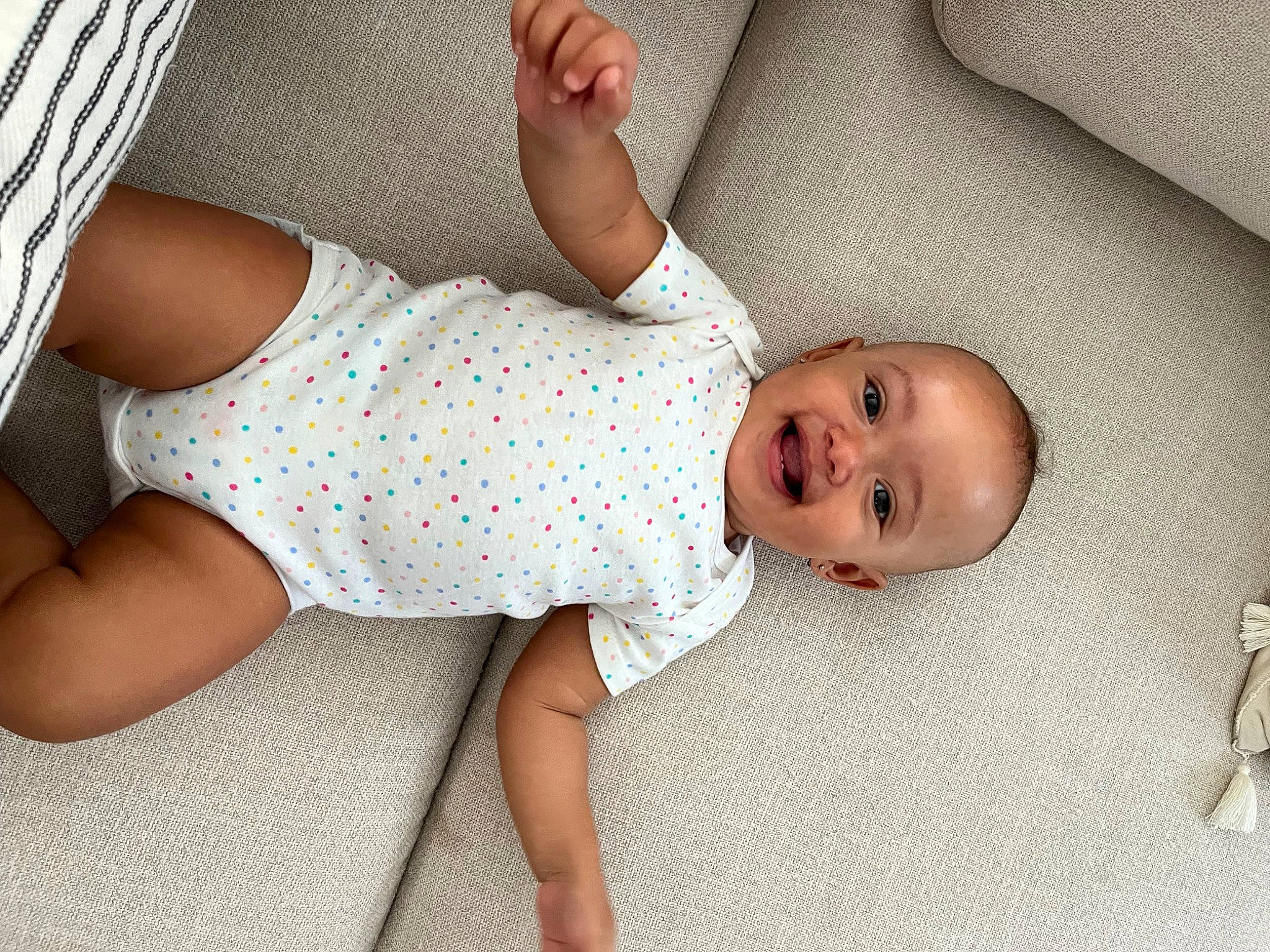 Giavanna is registered to the contest to win money with this photo: baby, baby_toddler_clothing, child, comfort, elbow, finger, foot, hand, human_body, human_leg, joint, knee, leg, nail, pattern, person, skin, sleeve, textile, thigh