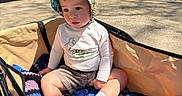 Bodhi joined the competition — help win amazing prizes! blanket, child, crocheted, driveway, grass, hat, long_sleeve_shirt, outdoor, person, plastic_cup, sandals, shadows, shorts, summer, sunhat, sunlight, toddler, toy_car, trees, wagon
