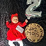 baby, infant, sleeping, red_dress, headband, balloon, number_2, cake, chocolate, milestone, celebration, blanket, white_tights, sock, birthday, two_months, cute, peaceful, portrait, laying_down